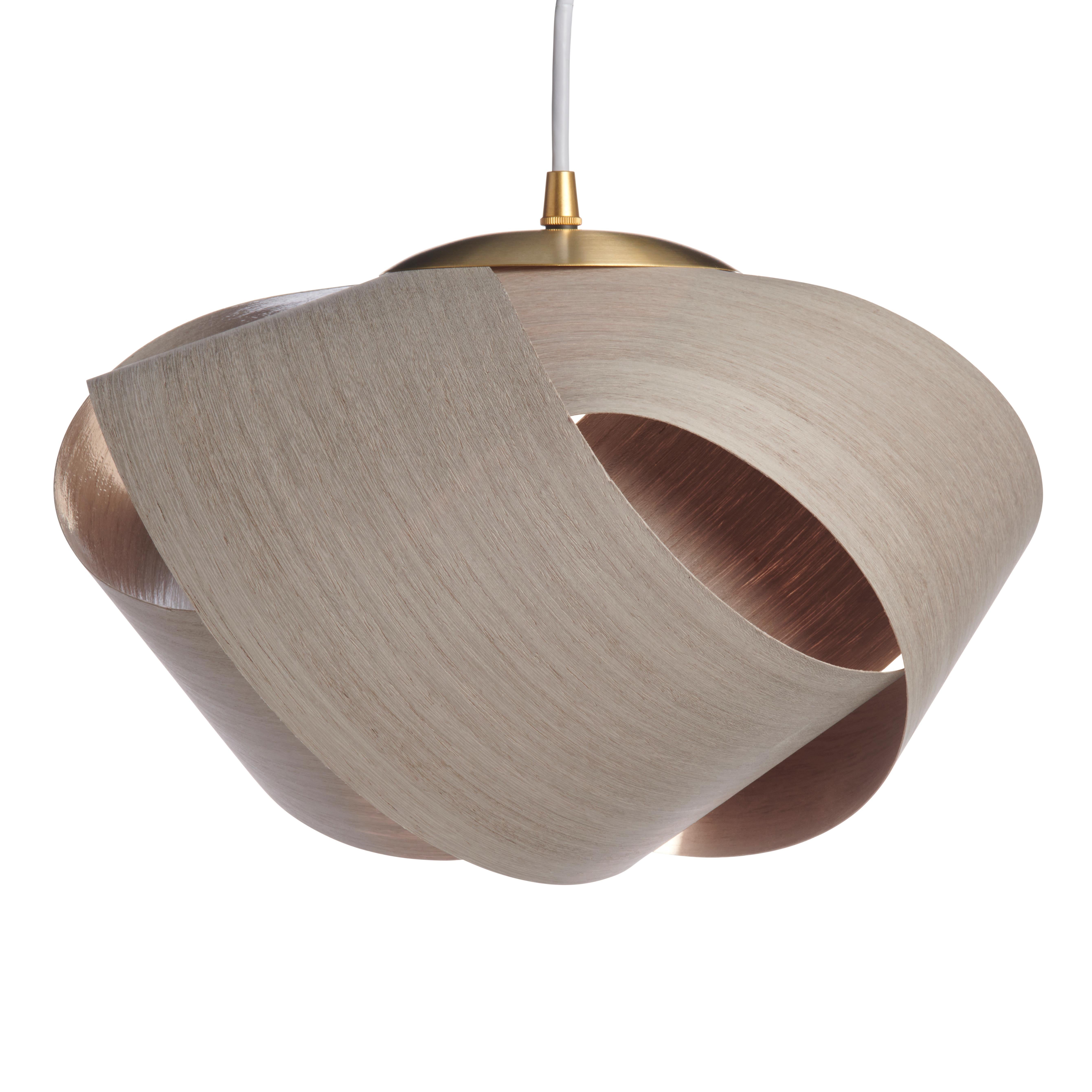 PETAL, featuring brushed brass hardware, is a contemporary Mid-Century Modern light fixture. An Organic-Modern piece with wood veneer and a brushed brass accent. This is a minimalist luxury pendant design which can be exhibited in dining rooms,
