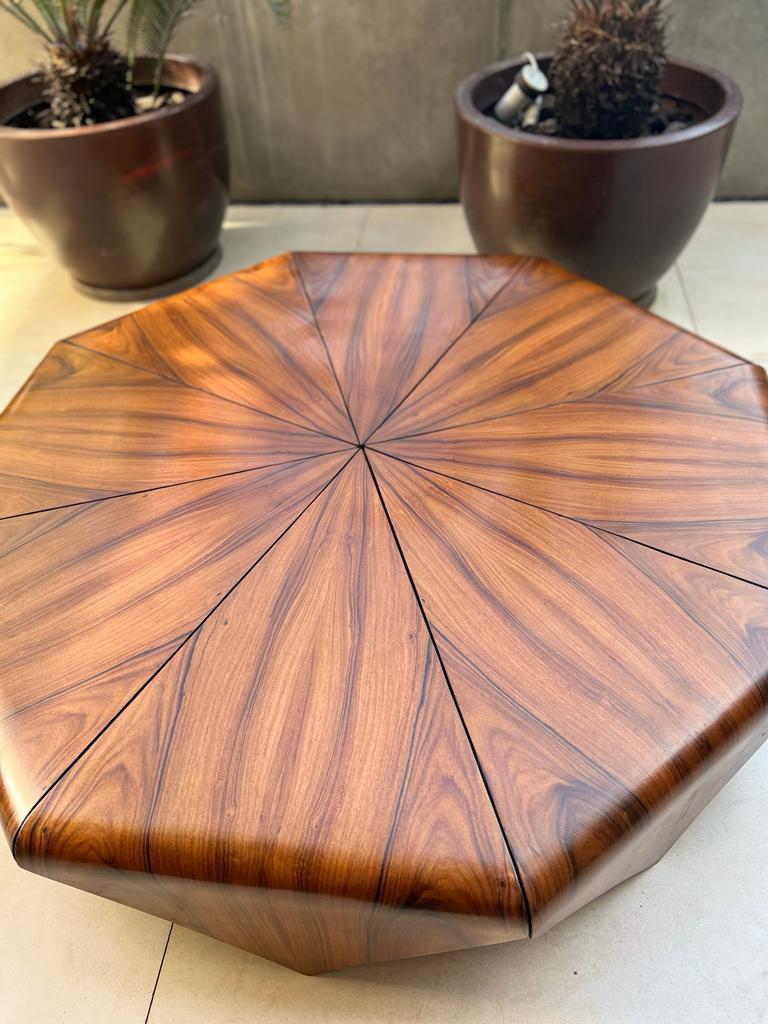 Designed by Jorge Zalszupin. 
Manufactured by his own company L’Atelier San Paolo in 1959. 

The iconic Petala round coffee table is inspired by a flower as it is  is formed by eight separate petals made of Brazilian Jacaranda wood held together by