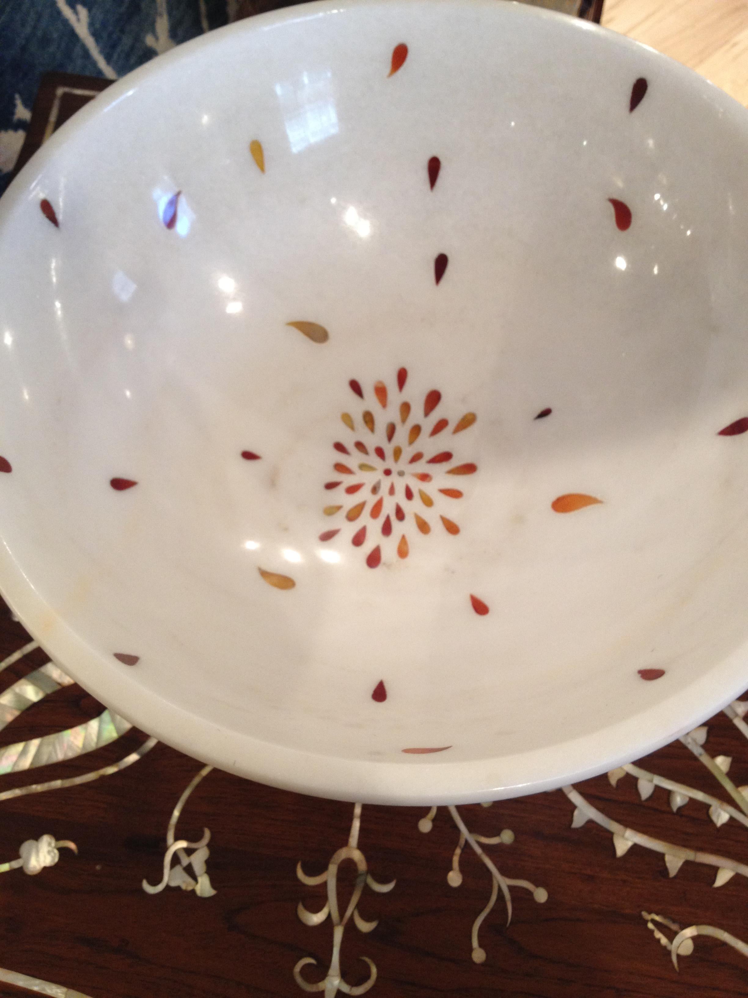Shown in Agra white marble inlayed with semi precious stones. Modern designs and patterns using the Pietra Dura method originated in Florence in the 17th century.

Petals Bowl in White Marble
Size- 16