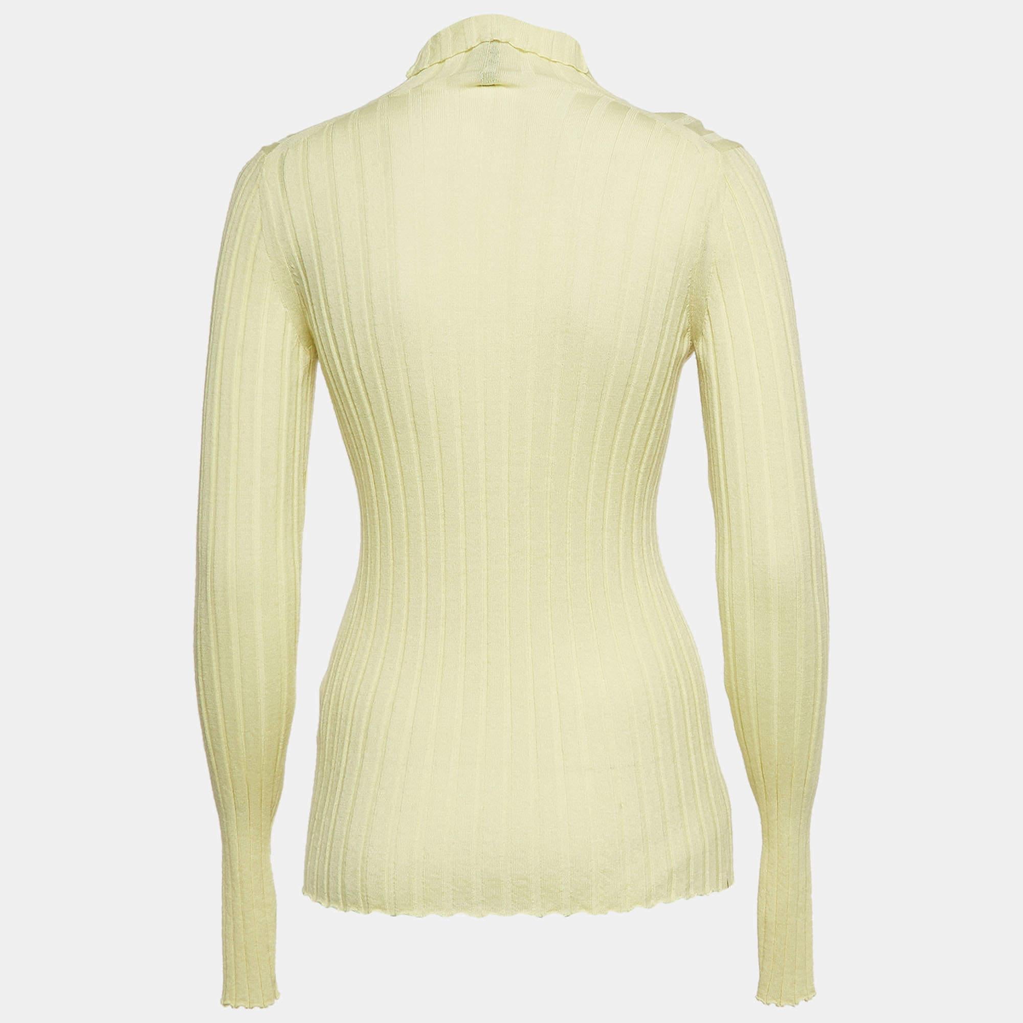 Le pull Petar Petrov associe des couleurs vives à une texture raffinée. Fabriqué en tricot côtelé de qualité supérieure  ce pull offre une coupe ajustée et une chaleur élégante. La teinte jaune vibrante est très remarquée.  tandis que le design à