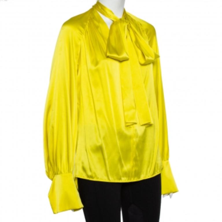 With a feminine aesthetic, Petar Petrov lets you master the subtle art of desk-to-dinner dressing with this top. A yellow top like this can be paired with contrasting bottoms to finish your look efforlessly. This satin top is a perfect example of a