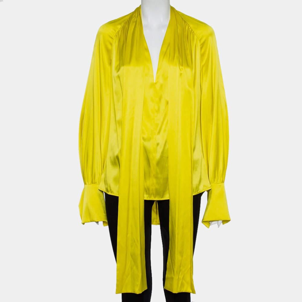 With a feminine aesthetic, Petar Petrov lets you master the subtle art of desk-to-dinner dressing with this top. A yellow top like this can be paired with contrasting bottoms to finish your look efforlessly. This satin top is a perfect example of a