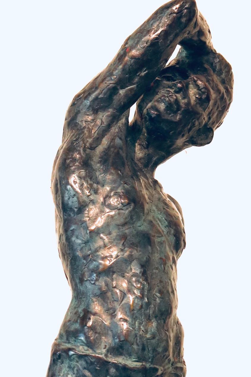 Roy- 21st Century Sculpture of a bare chested male figure standing - Gold Nude Sculpture by Peter Adams