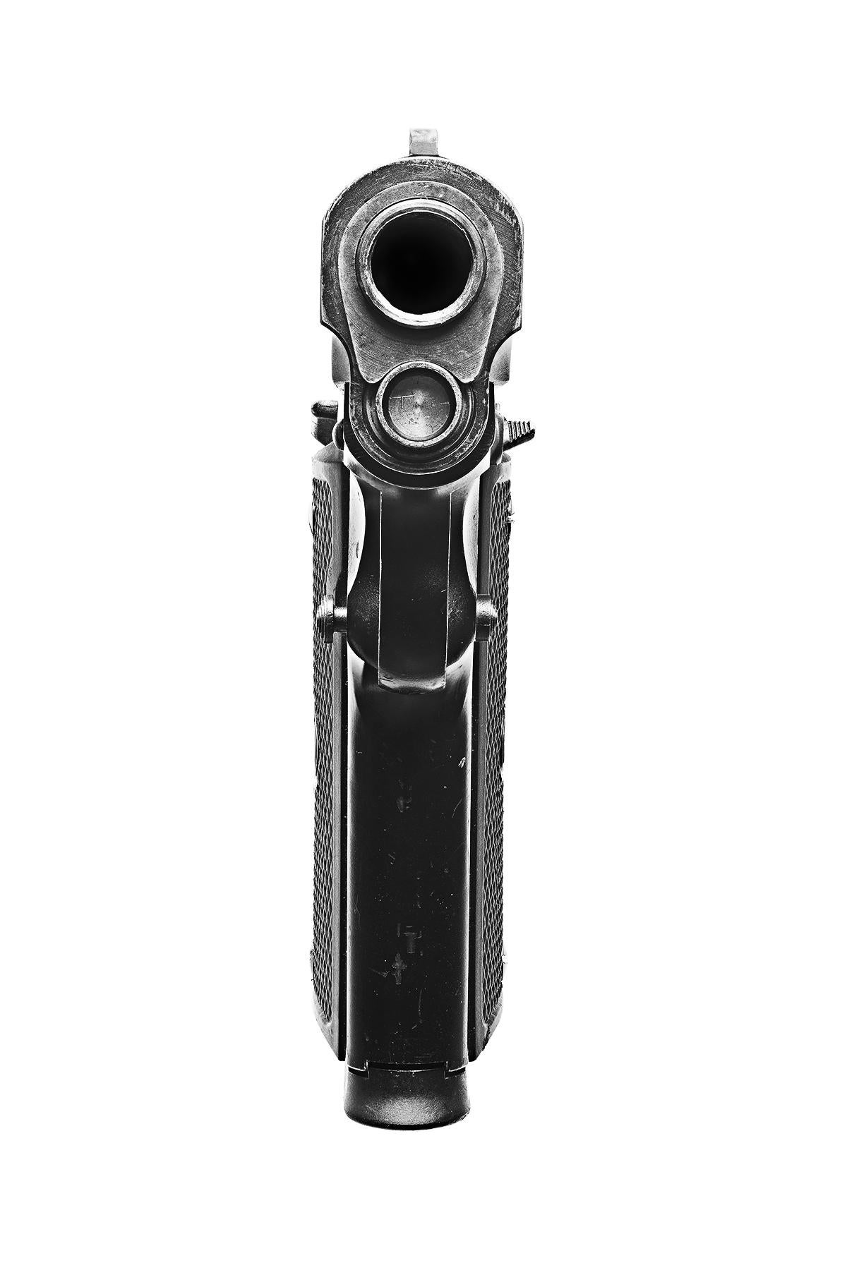 Colt 1911
Digital C-Print / Archival Pigment Print
Edition of 20 per size
Available sizes:
36 x 72 in
48 x 96 in

In Point Blank, Lusztyk’s magnification of handguns at once anthropomorphizes and abstracts its subject to create demystified portraits