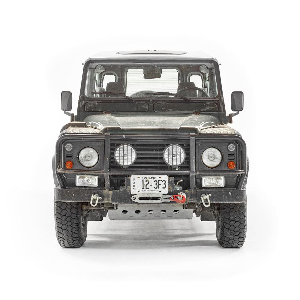 Defender
Digital C-Print / Archival Pigment Print
Edition of 5 per size
Available sizes:
24" x 24"
36" x 36"
48" x 48"

Lusztyk’s “Collectible” series is a macro level exploration of coins, bills and stamps. These images are created with the