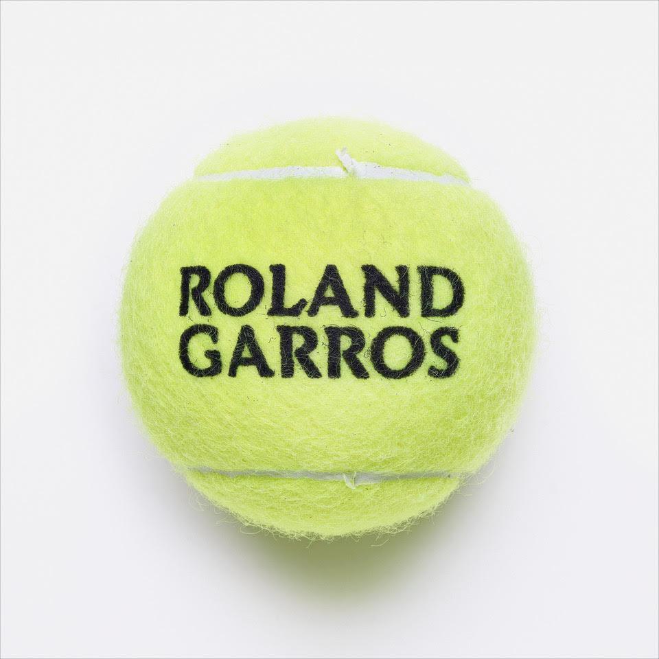 Roland Garros Tennis Ball
Digital C-Print / Archival Pigment Print
Edition of 5 per size
Available sizes:
24" x 24"
36" x 36"
48" x 48"

Lusztyk’s “Collectible” series is a macro level exploration of coins, bills and stamps. These images are created