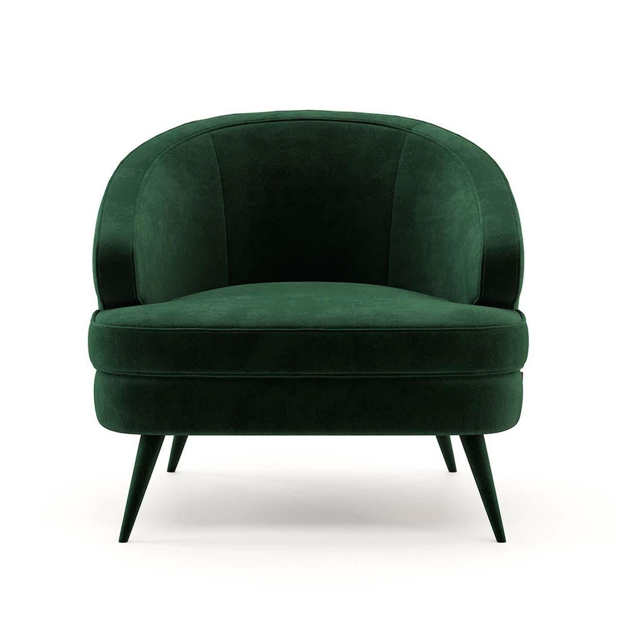Armchair Peter with solid wood structure,
upholstered and covered with British green
velvet fabric, with black oak feet.
Also available with other fabric finishes on request.