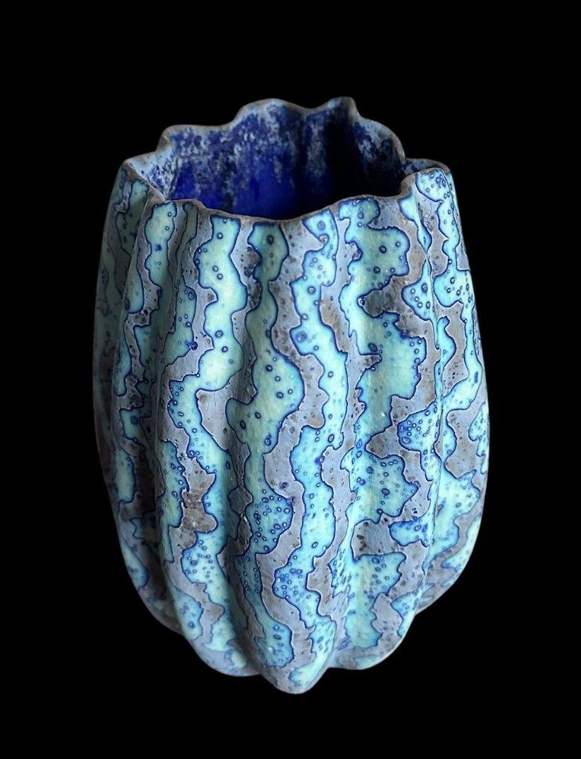 PB33
Peter Beard Undulating Vase in a Wax Resist Glaze
2024
19cm high, 14cm wide, 12 cm deep