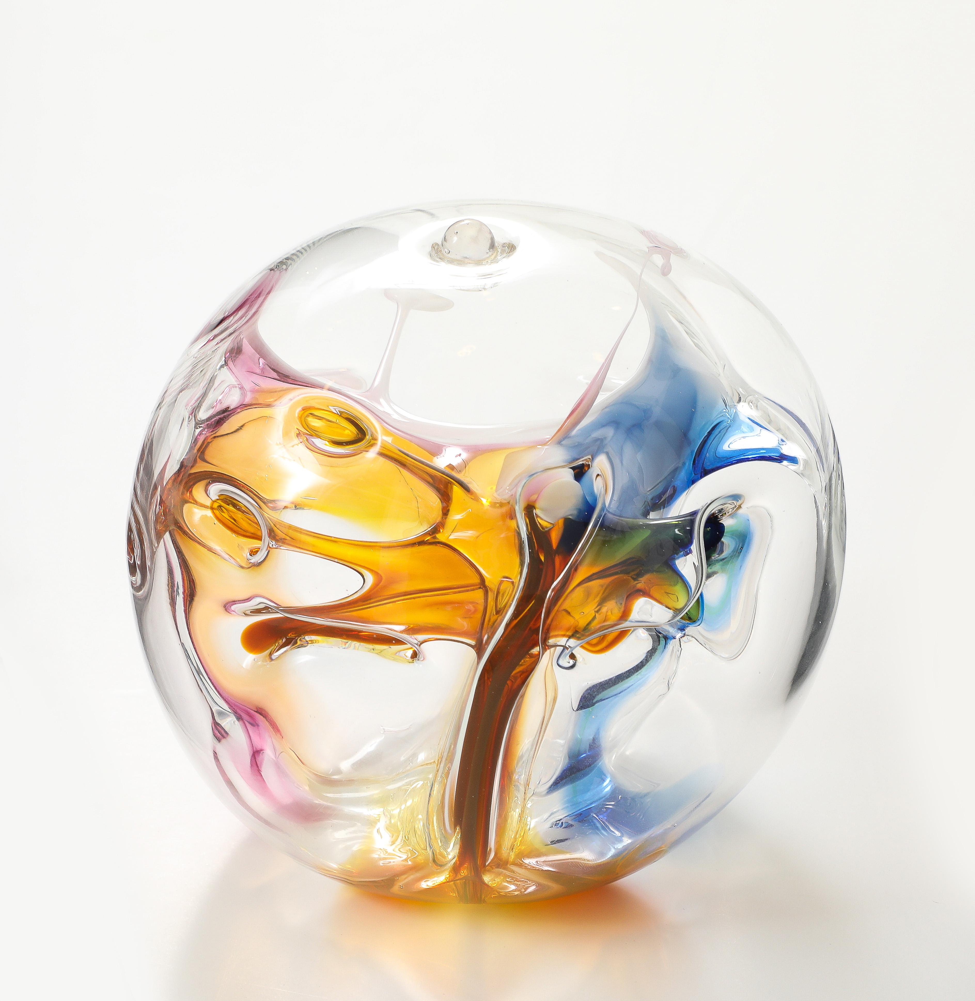Wonderful blown glass Orb sculpture signed and dated by Peter Bramhall
The sculpture has internal glass threads in  a beautiful array of colors.