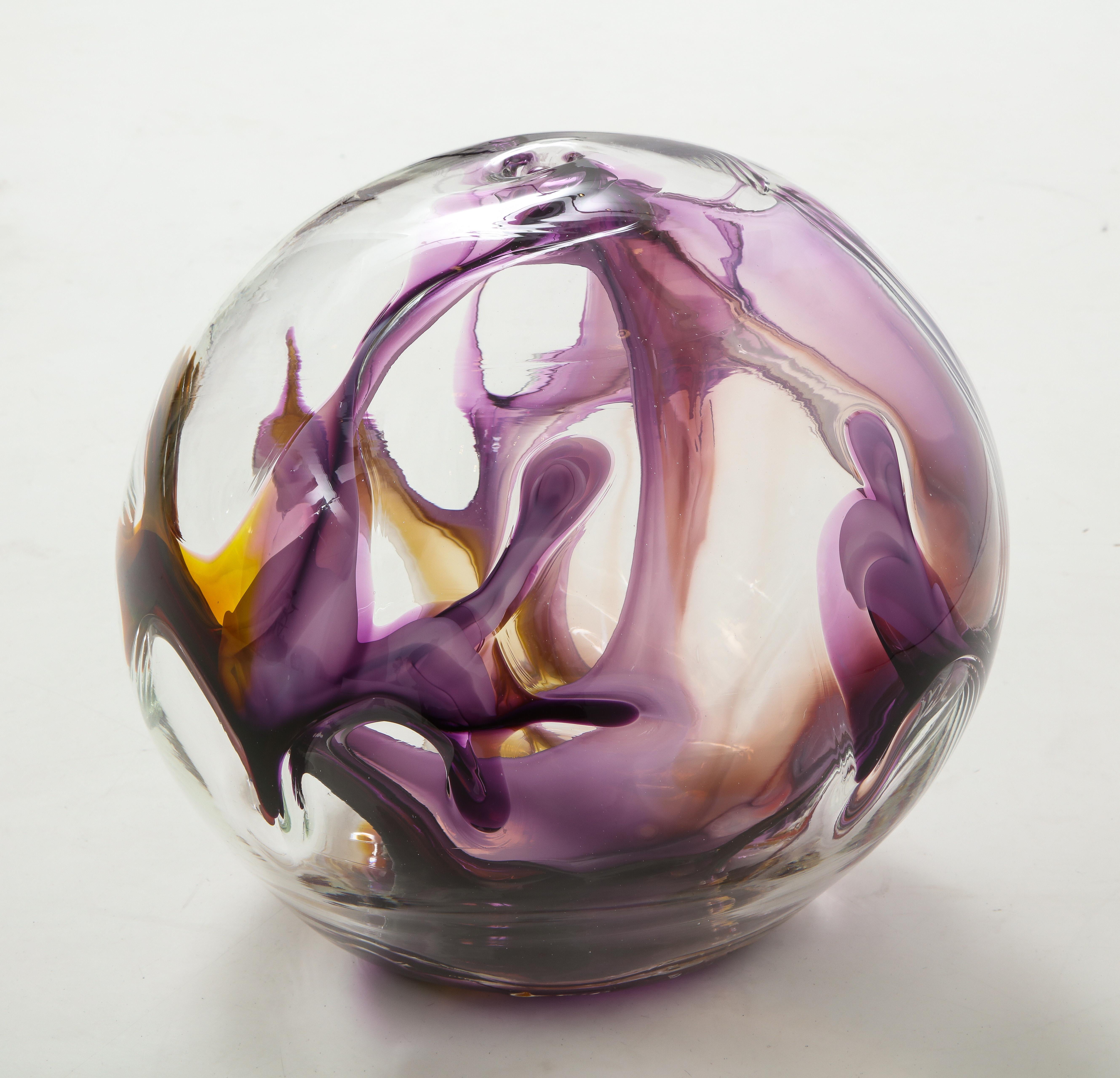 Multicolored hand blown glass sculpture with internal glass threads of
Amber, Lilac and Magenta.
Signed and dated on the bottom.
