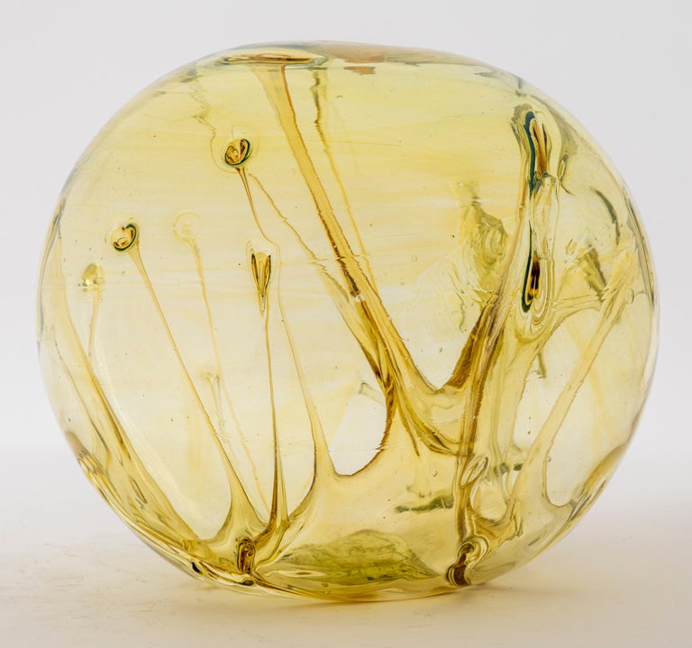 Peter Bramhall (b. 1942) American Postmodern studio art glass orb sculpture with internal organic stem structure, signed 'Bramhall 7/8/80' on the bottom. 8