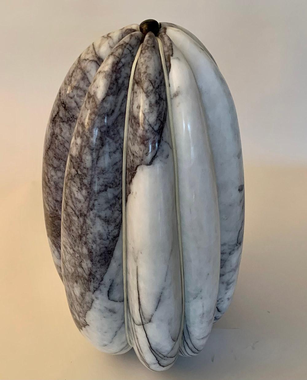 Lilac marble, rawhide, ebony wood, 54 cm × 28 cm × 31 cm.
Unique work delivered with a certificate of authenticity. 
Peter Brooke-Ball's works surprise with their humour, simplicity and sensuality. As he himself states, the desire is to create