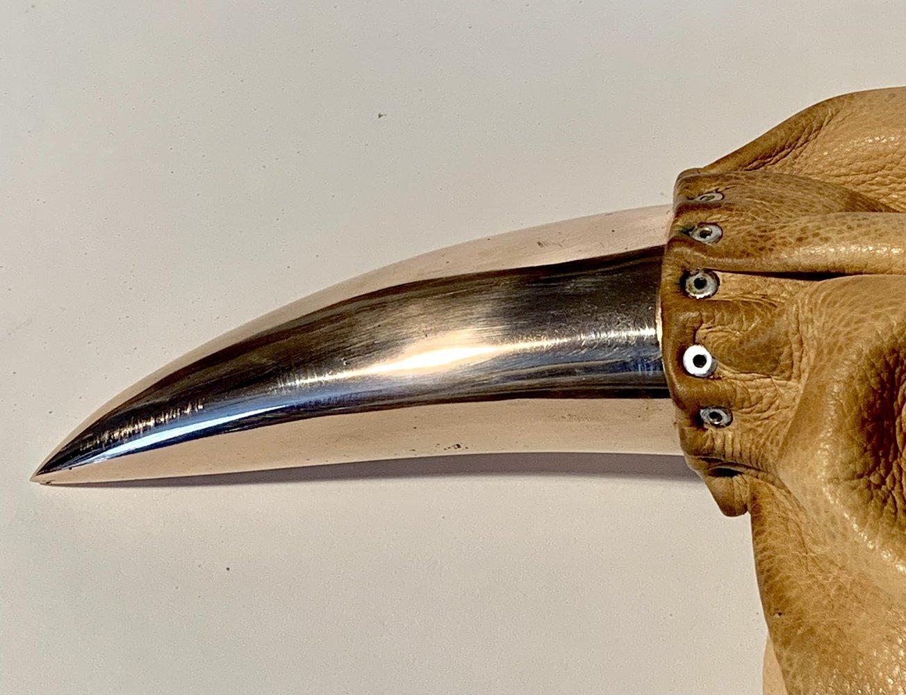 Bronze, leather, steel, sand, cotton cord, 15 cm × 40 cm × 19 cm.
Unique work delivered with a certificate of authenticity. 
Peter Brooke-Ball's works surprise with their humour, simplicity and sensuality. As he himself states, the desire is to