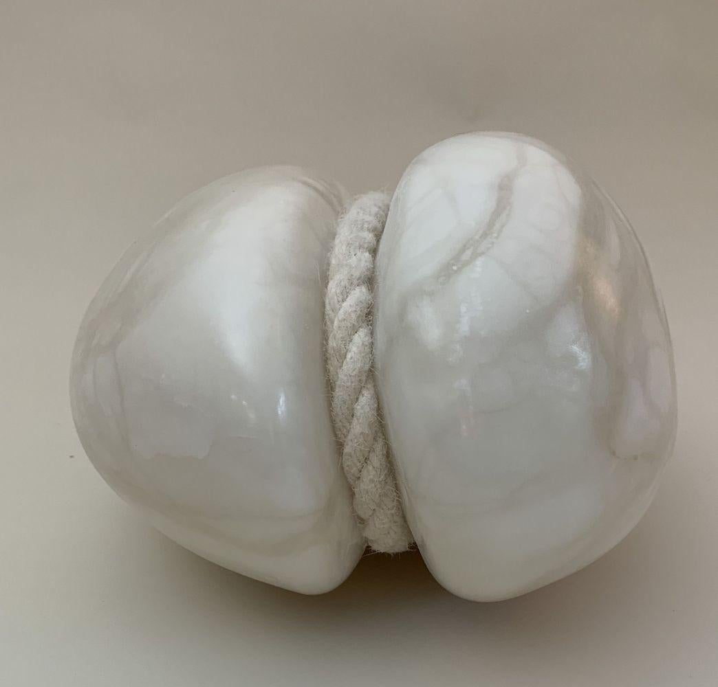 Freedom is a unique Alabaster and rope sculpture by contemporary artist Peter Brooke-Ball, dimensions are 23 × 21.5 × 17.5 cm (9.1 × 8.5 × 6.9 in).  
The sculpture comes with a certificate of authenticity.

The humour, simplicity, and sensuality of