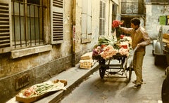 Vendeur de fleurs parisien en couleur 1956-61 de Peter Cornelius Giant