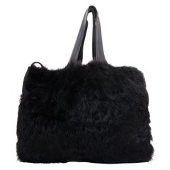 PETER DO Schwarze Shearling Pelz geschmeidig weiches Leder weißes Logo Umhängetasche
