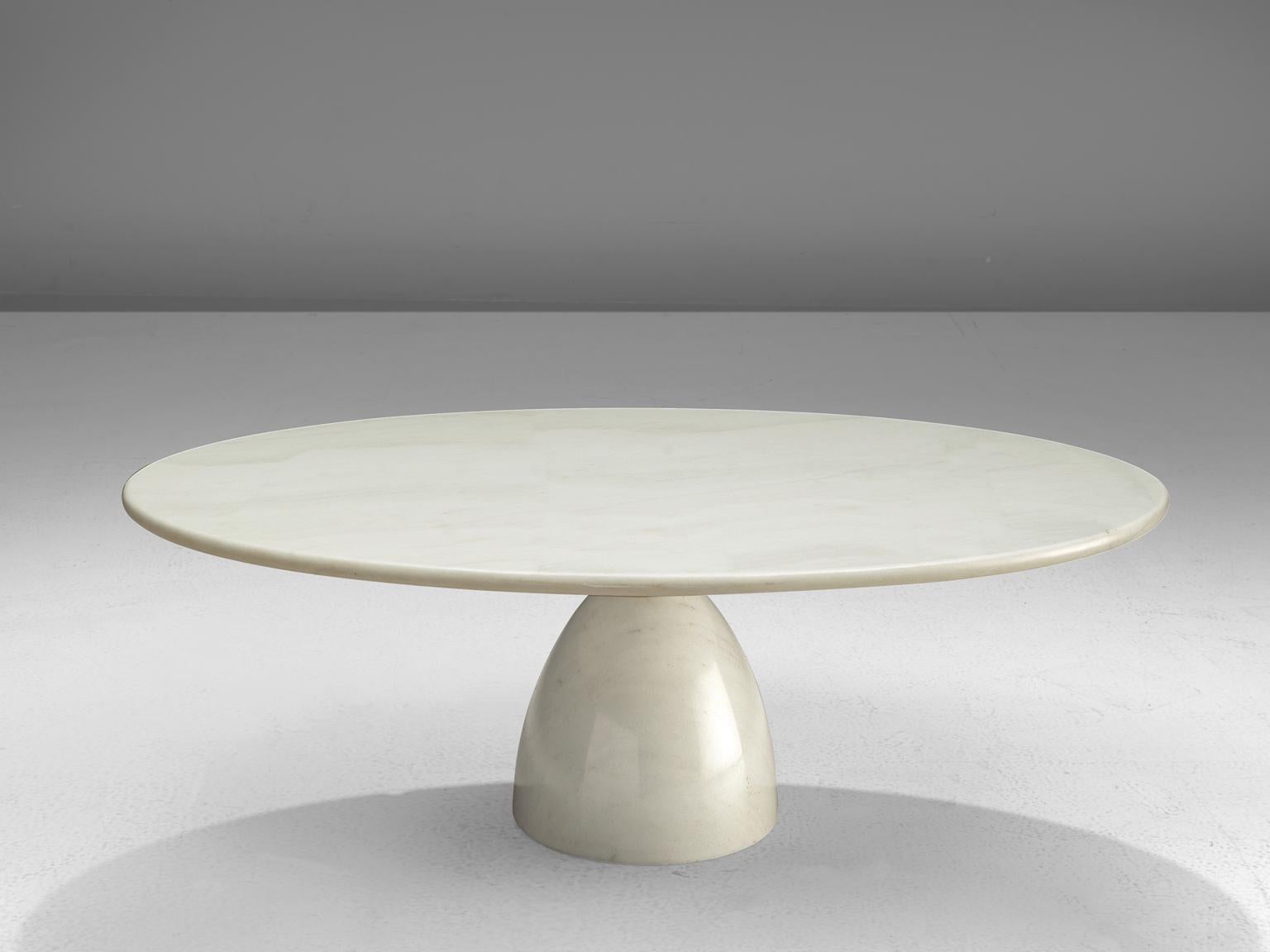 Peter Draenert, coffee table, marble, Germany, circa 1972

This strong cocktail table features a column foot and a thick oval tabletop. The aesthetics are archetypical for postmodern design, bearing references to architectural forms and without a