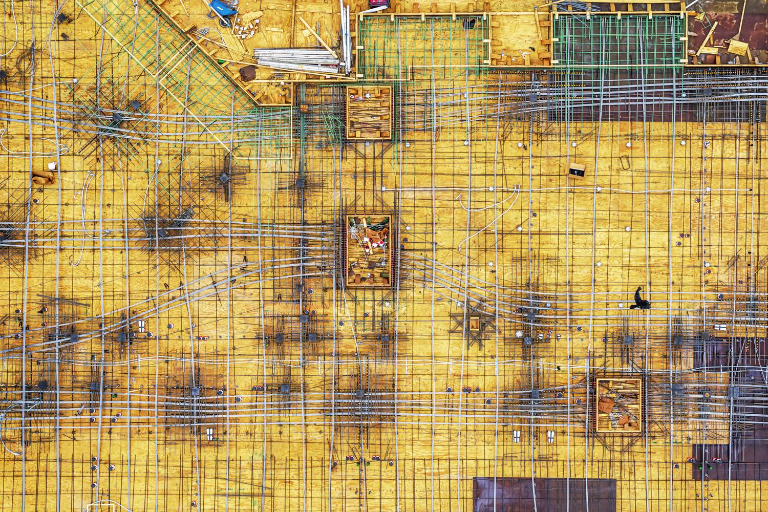 Peter Essick Abstract Photograph - "Construction Site, Atlanta, GA #3, 2023" - drone photography, geometric, yellow