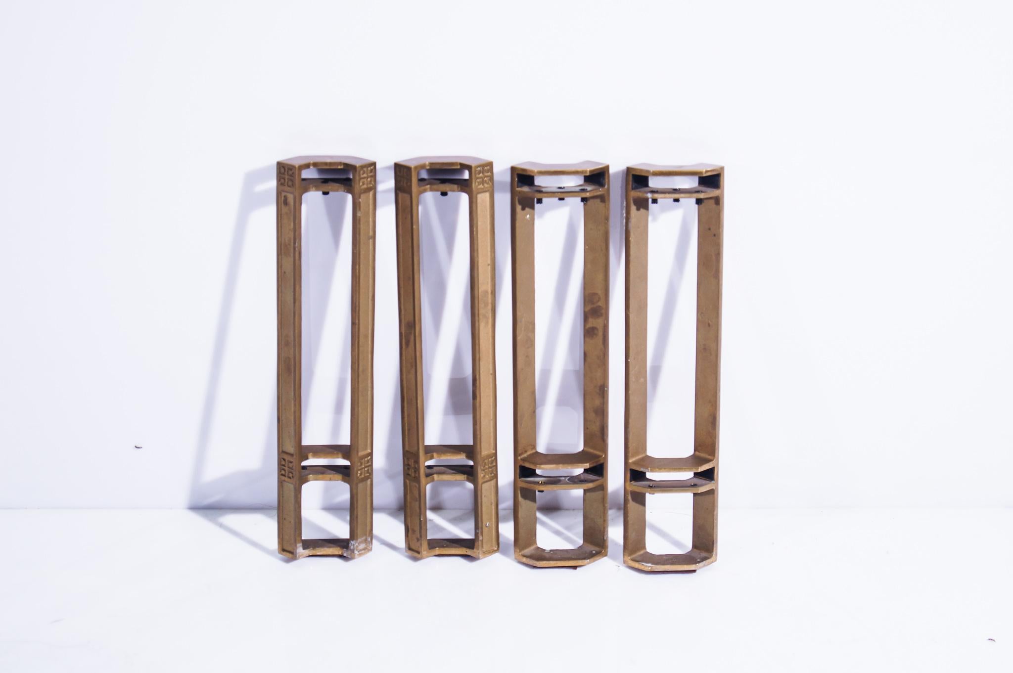 Peter Ghyczhy - Set of 4 Bronze tablelegs
 

Netherlands, 1970's.

Set of 4 cast bronze table legs. Every leg has 2 spaces for glass table top of preference. Glass is cheaper to make in your favorite measurements, than to transport it nowadays.