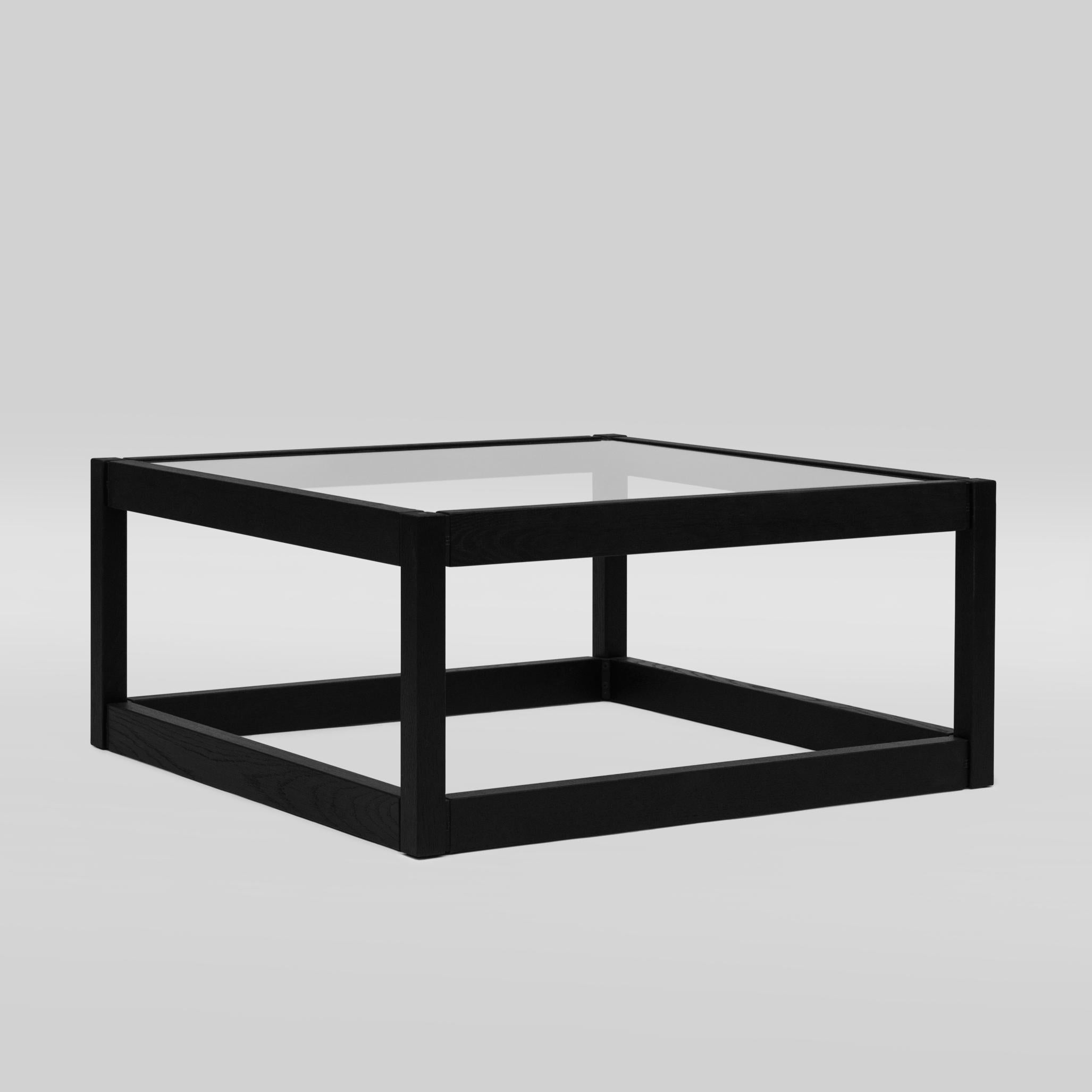 Contemporary coffee table designed by Peter Ghyczy.
Manufactured by Ghyczy (Netherlands)

This furniture tells an intriguing dialogue between history and modernity. The joints are an evolution of a design by Peter Ghyczy from begin of the 1970s.
