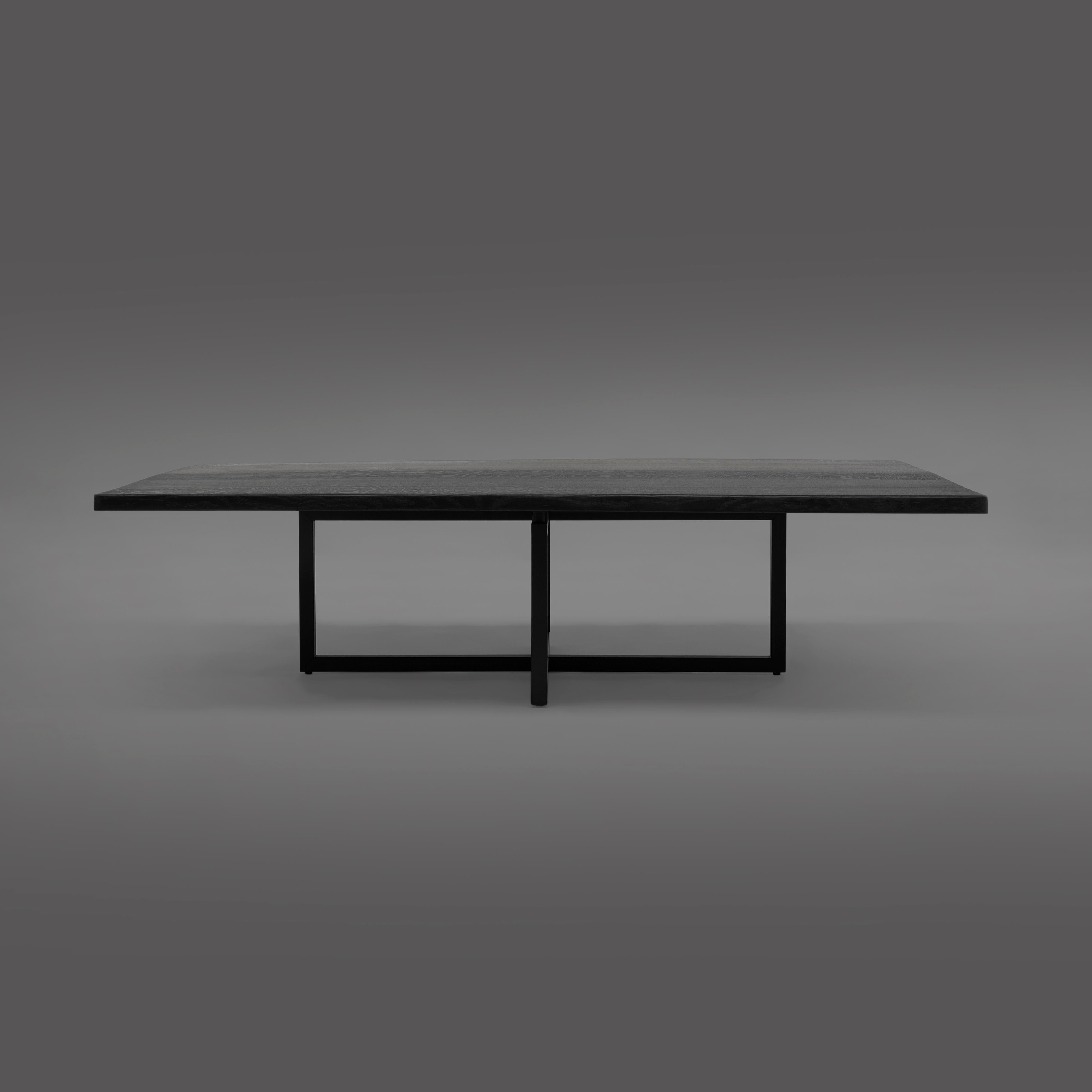 Coffee table designed by Peter Ghyczy.
Manufactured by Ghyczy (Netherlands)

Intersecting frames, connected by cast metal elements, create the structure for this very rigid table frame. Suitable for a wide range of tables; co ee table, console