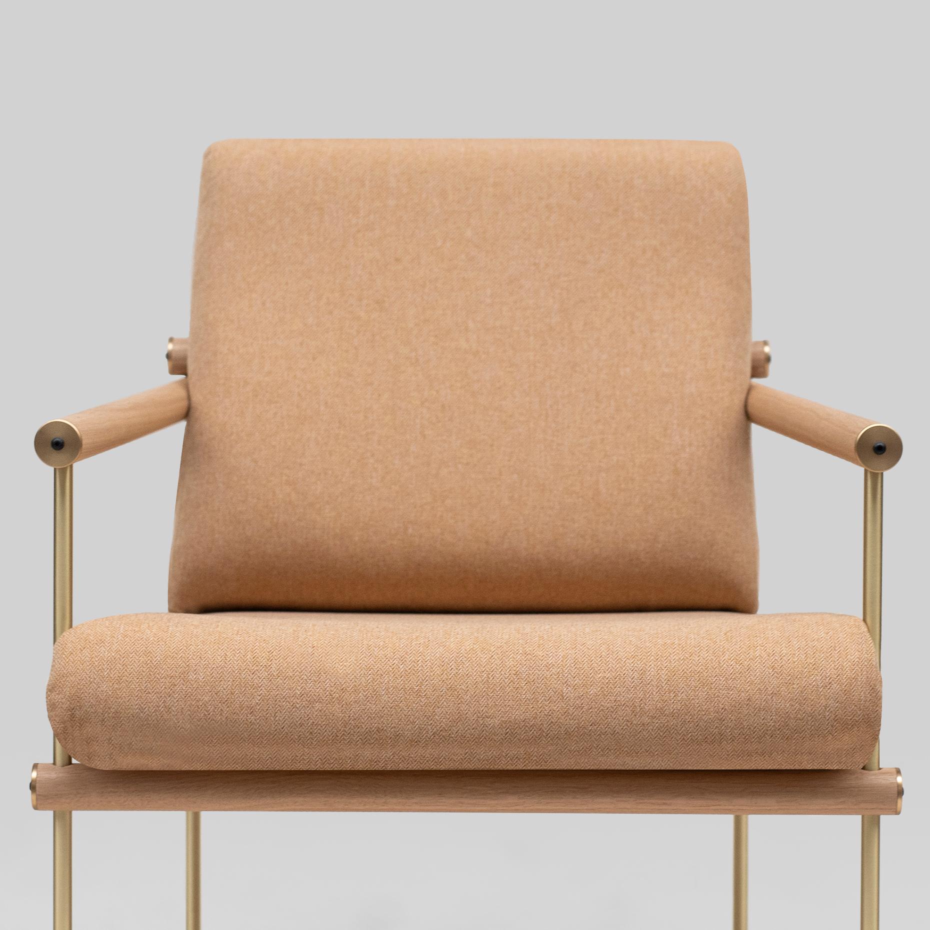 Armchair designed by Peter Ghyczy.
Manufactured by Ghyczy (Netherlands)

Playful construction of solid wooden rods and metal tubing is made possible by a special joinery between wood and metal. The loose seat and backrest cushions can be adjusted to
