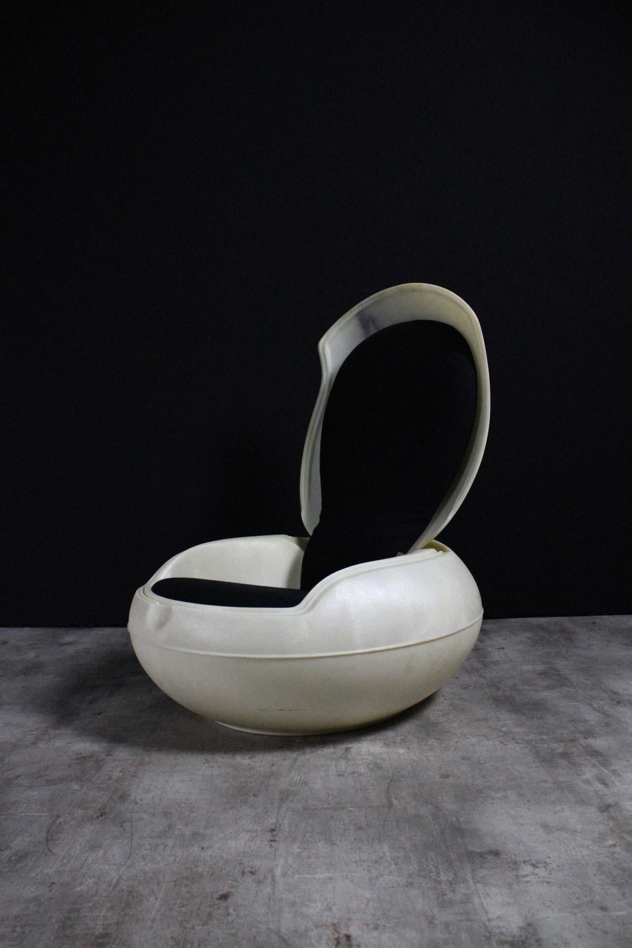 The Garden Egg Chair is one of Peter Ghyczy's best known design pieces. It is a true Space Age icon familiar to many. Peter Ghyczy designed and produced the Egg Chair in 1968 of which these signed 90's models exists in a small edition, with black