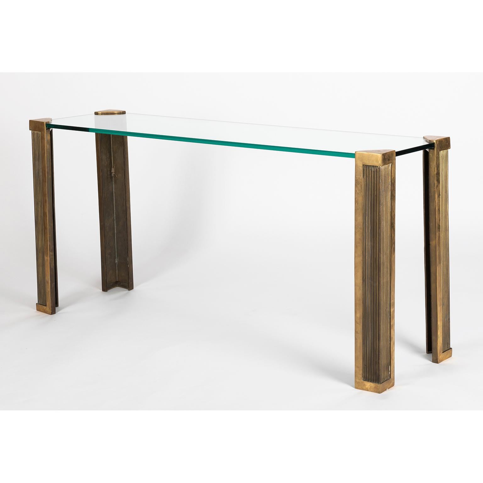 Originaly from Budapest, Peter Ghyczy has been living in the Netherlands for many years and this is where he creates and produces his furniture.

This both elegant and impressive console table is a design from the 1970s.
The thick glass (15mm)