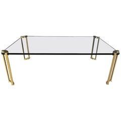 Peter Ghyczy style coffee table in brass and glass