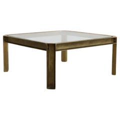 Tavolino in stile industriale in ottone e vetro Peter Ghyczy T09