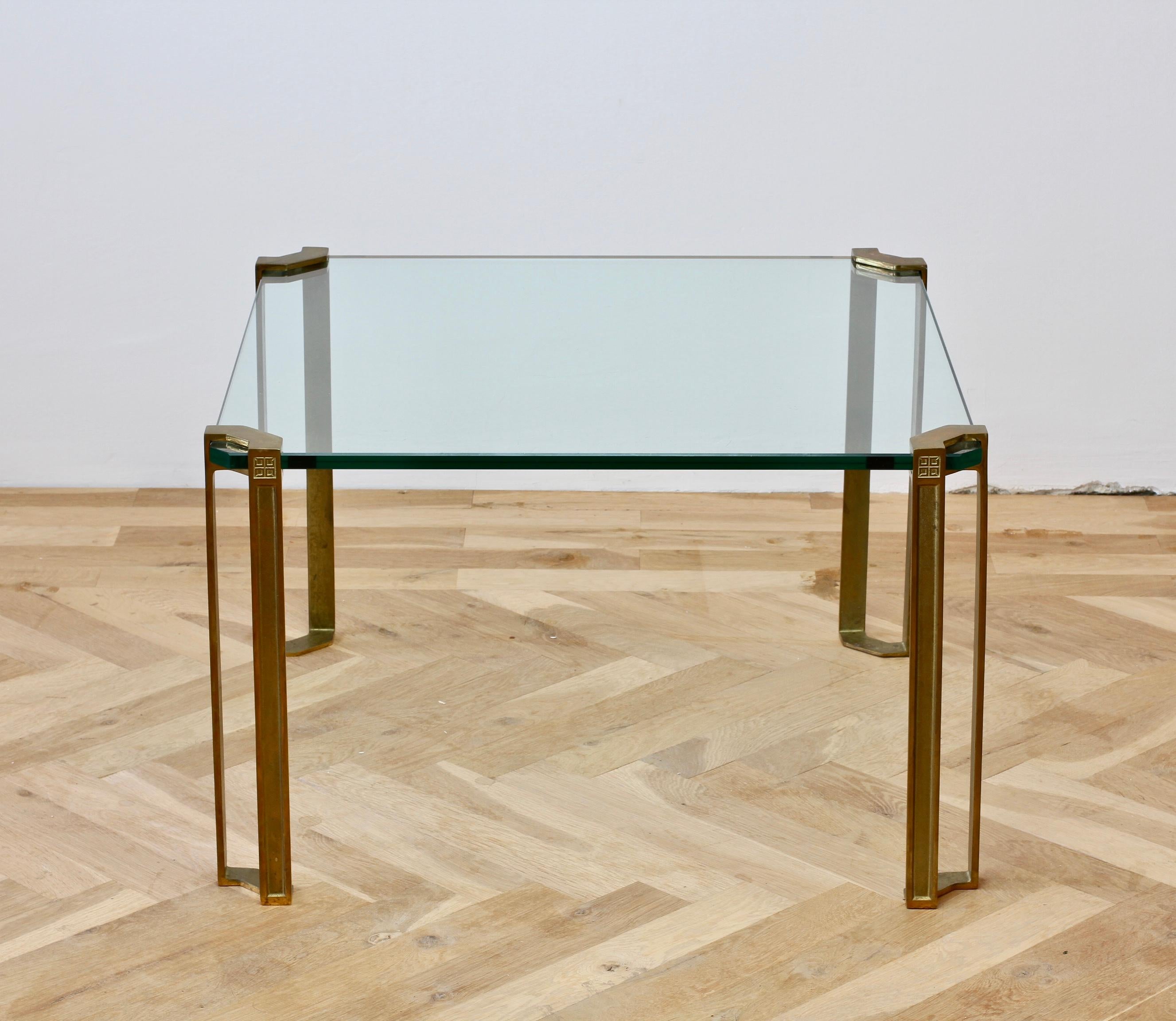 Pair of Peter Ghyczy 'T24 Pioneer' square end or coffee tables in cast bronze. Designed by Hungarian born designer Peter Ghyczy circa 1975 / 1980s featuring his pioneering casting techniques and way of suspending glass and metal.

Thick 15mm clear
