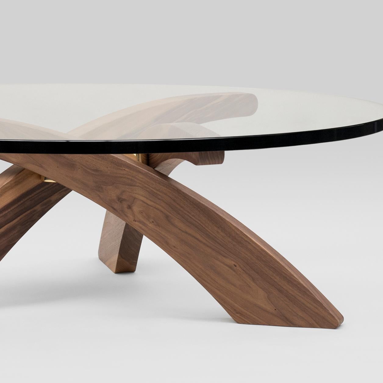 Table designed by Peter Ghyczy.
Manufactured by Ghyczy (Netherlands)


Wooden beams formed to symbolise the weight resting on them. It is bent like the curve of a spine. Thinner at the top and stronger at the bottom. 3 legs are chosen for harmony
