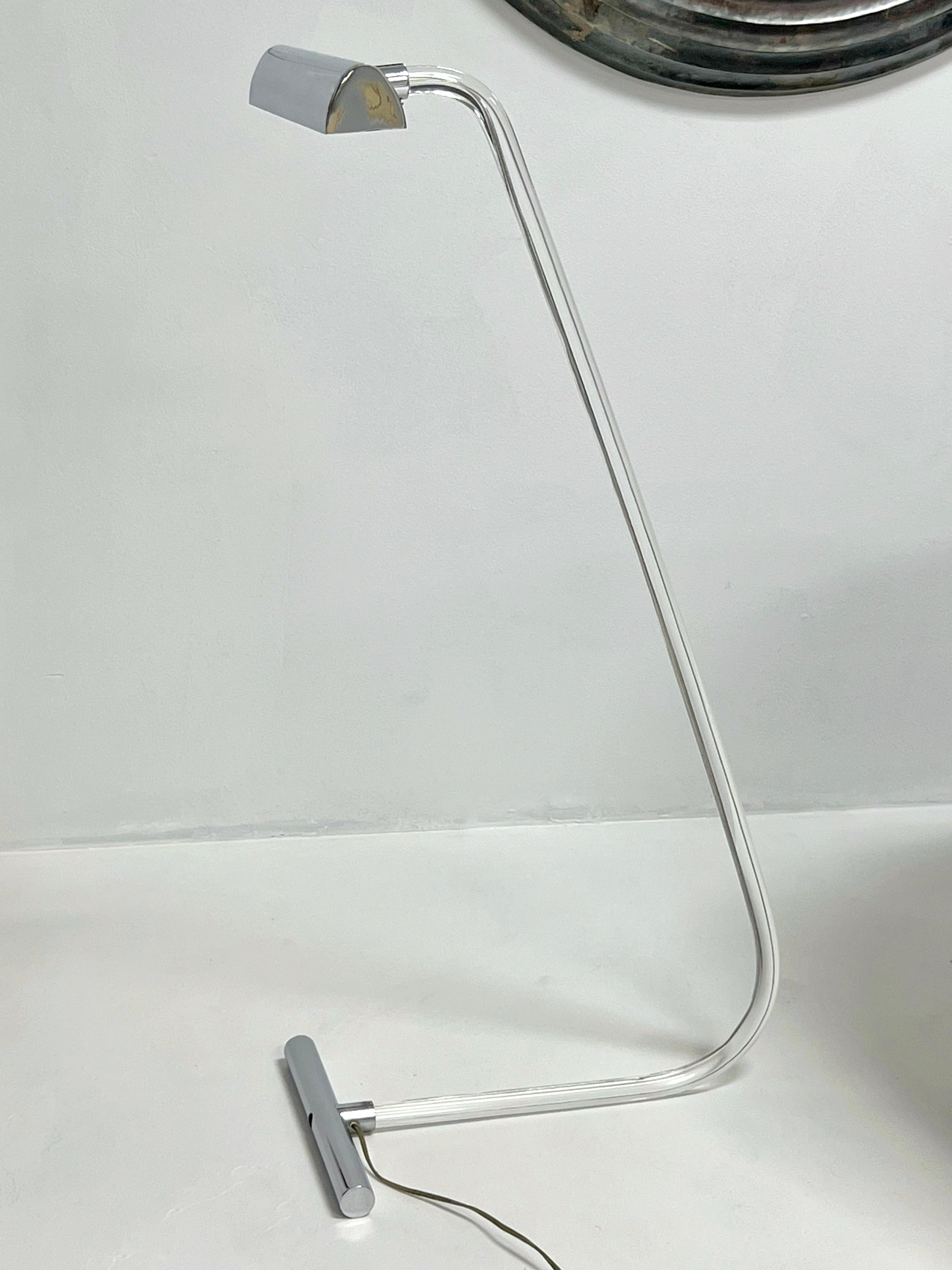 A floor lamp designed by Peter Hamburger. From the Crylicord line by Knoll. 