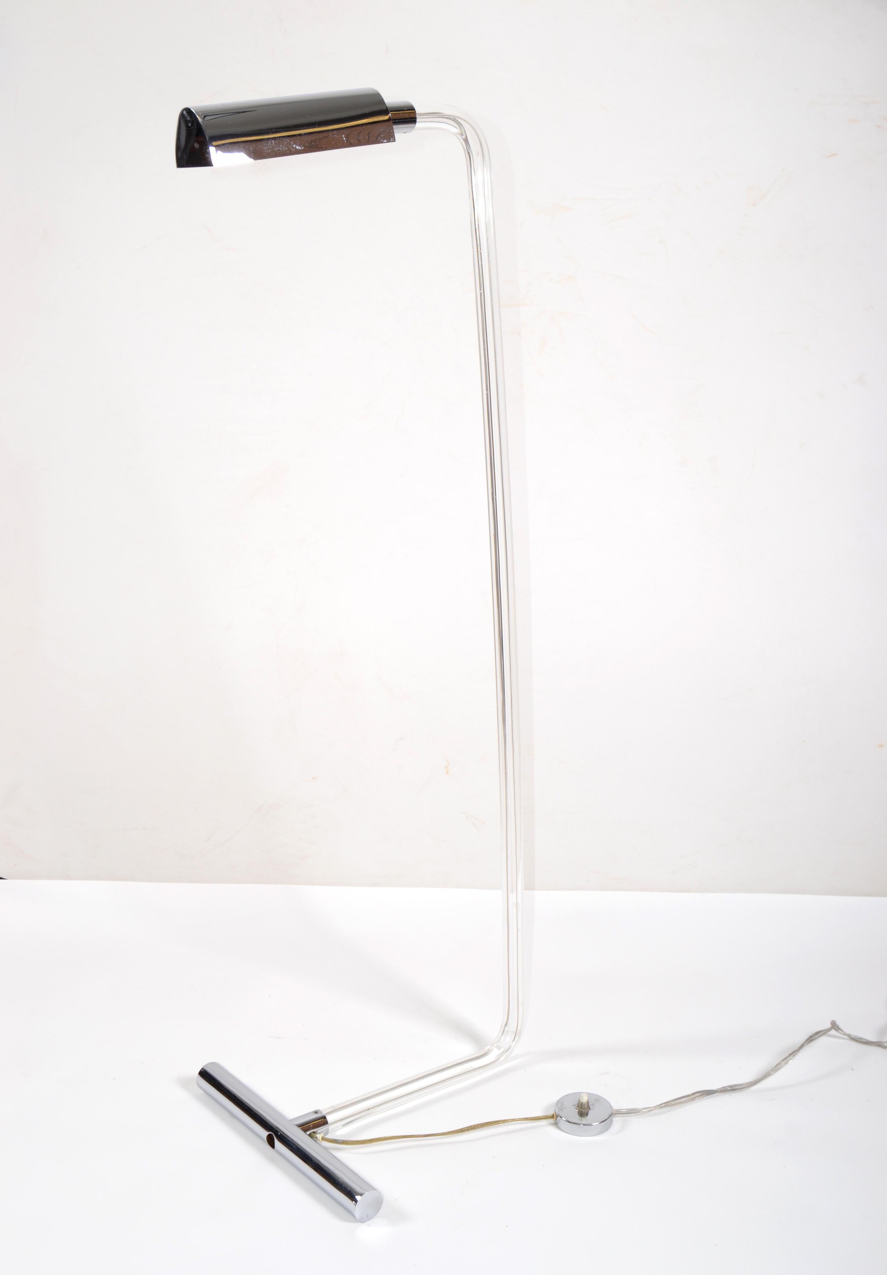 Elegant Lucite and chrome floor lamp from the 1970s designed by Peter Hamburger and made by George Kovacs Lighting.
Uses a Halogen bulb with max. 40 watts.
Comes with a footswitch and is in perfect working condition.