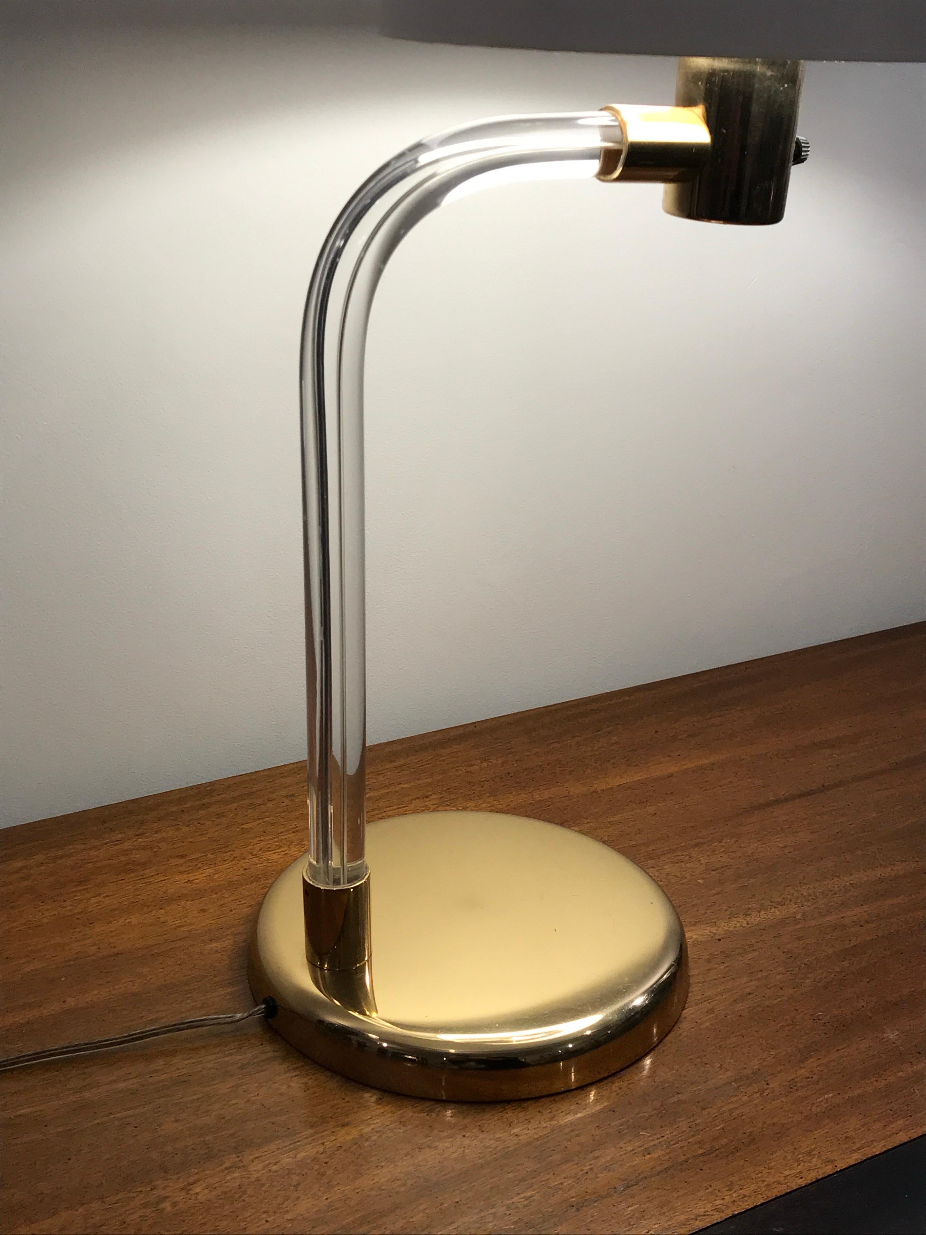 Iconic acrylic and polished brass table lamp by Peter Hamburger for Knoll, 1970's.