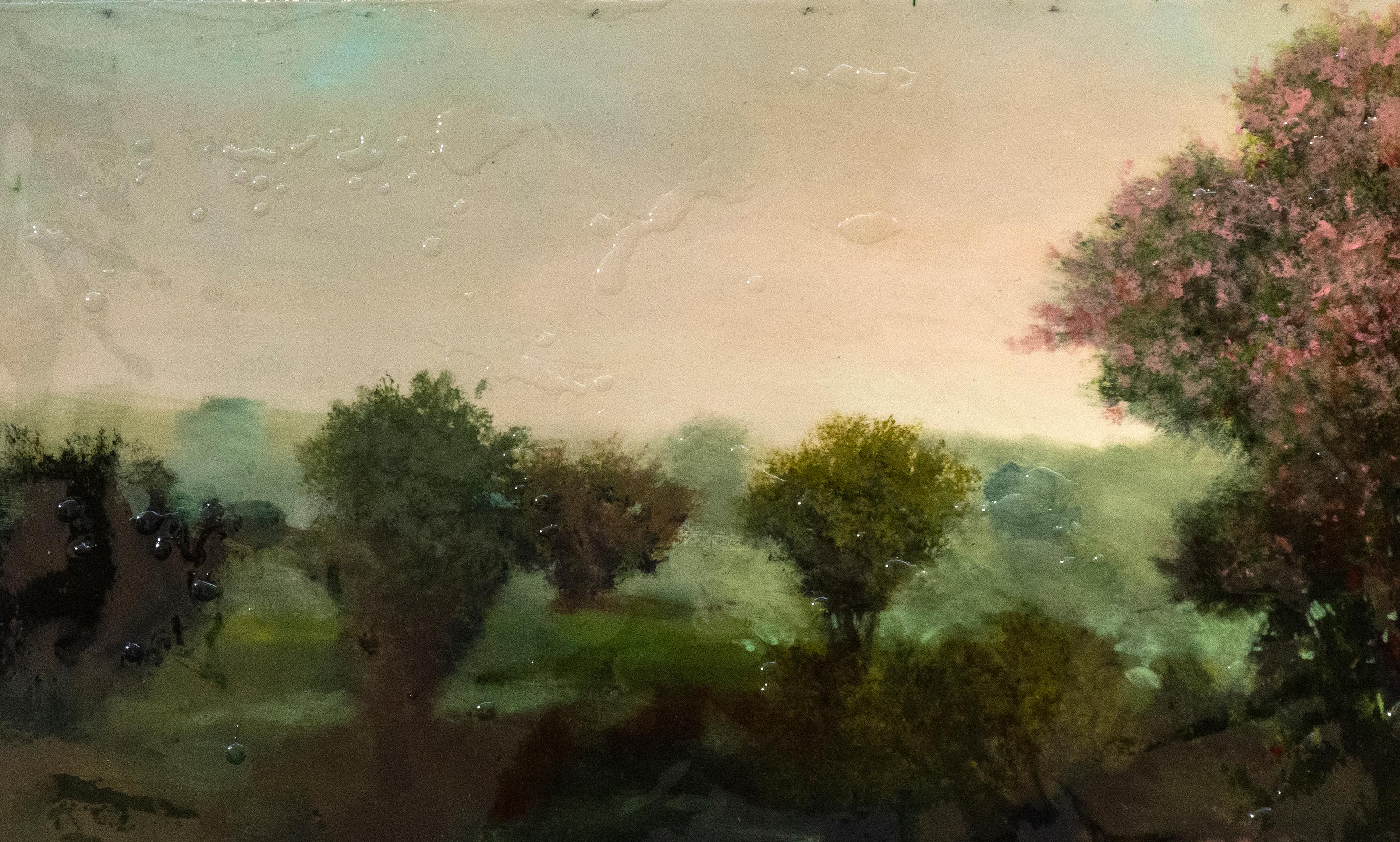 A tall tree, its leaves lit pink and cerise by the glow of a setting sun is framed by an atmospheric mauve sky in this landscape by Peter Hoffer. The painting is finished with a layer of resin and evokes nostalgia for classical forms and