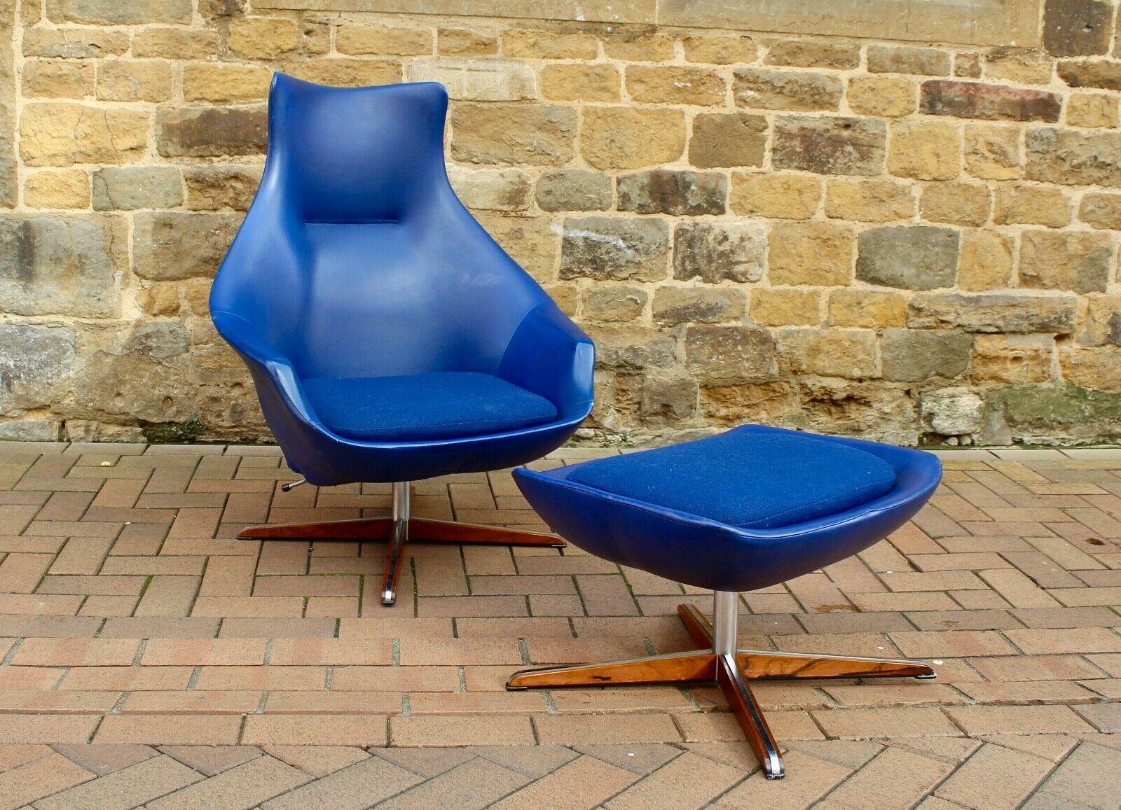 These are an extremely rare original circa, 1960s lounge chair with matching footstools by British designer Peter Hoyte.

This chair is covered in its original electric blue vinyl blue with beautiful steel and rosewood bases and the original Peter