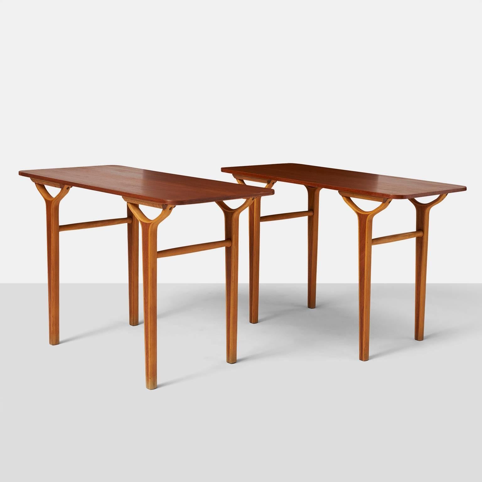 Peter Hvidt & Orla Molgaard Nielsen AX series side tables.
A rare pair of side tables in teak and beech form the AX series for Fritz Hansen.
Denmark, circa 1950s.