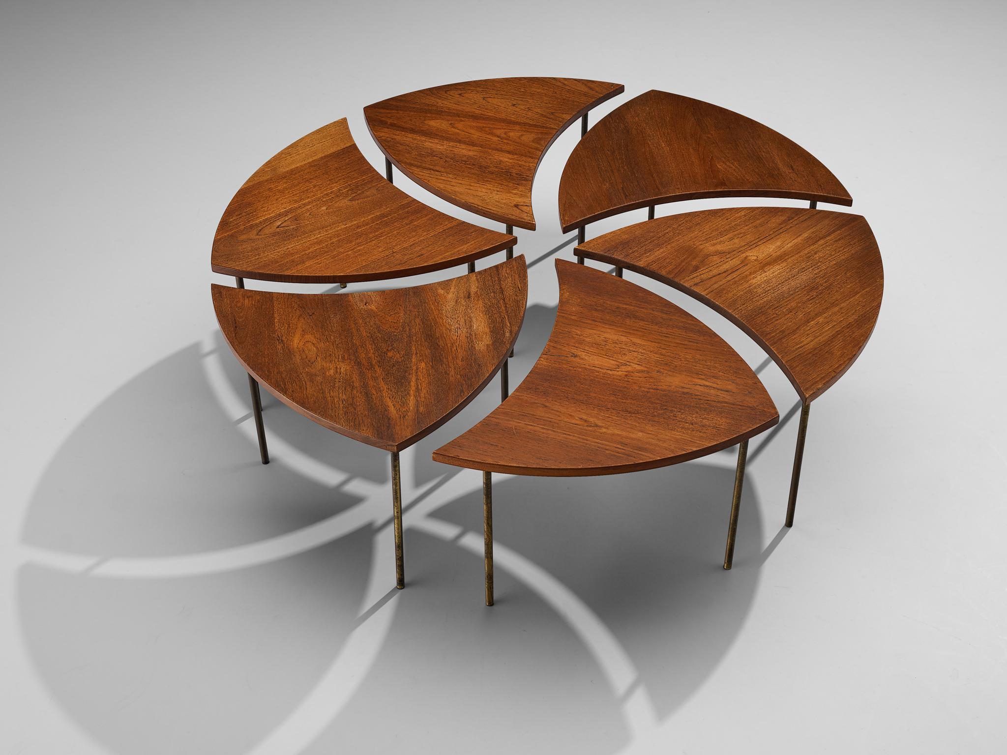 Peter Hvidt and Orla Mølgaard Nielsen coffee table 'FD 523', teak, brass, Denmark, 1950s. 

A modular coffee table, consisting of 6 organic triangular segments that form together one large round coffee table or different dynamic shapes. The legs