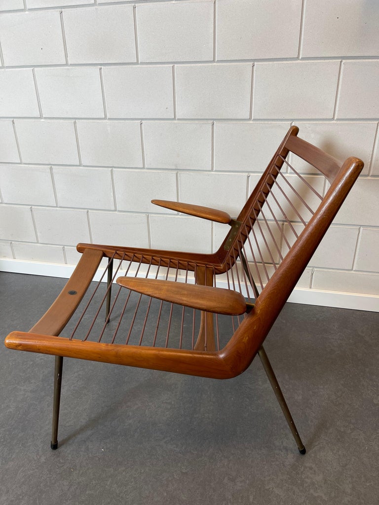 Peter Hvidt and Orla Mølgaard Nielsen are the Danish duo that designed this easy chair.
The chair is called the Boomerang chair. This specific one for sale is an early version. Designed in the 1950-ies. It is the teak version with newly upholstered