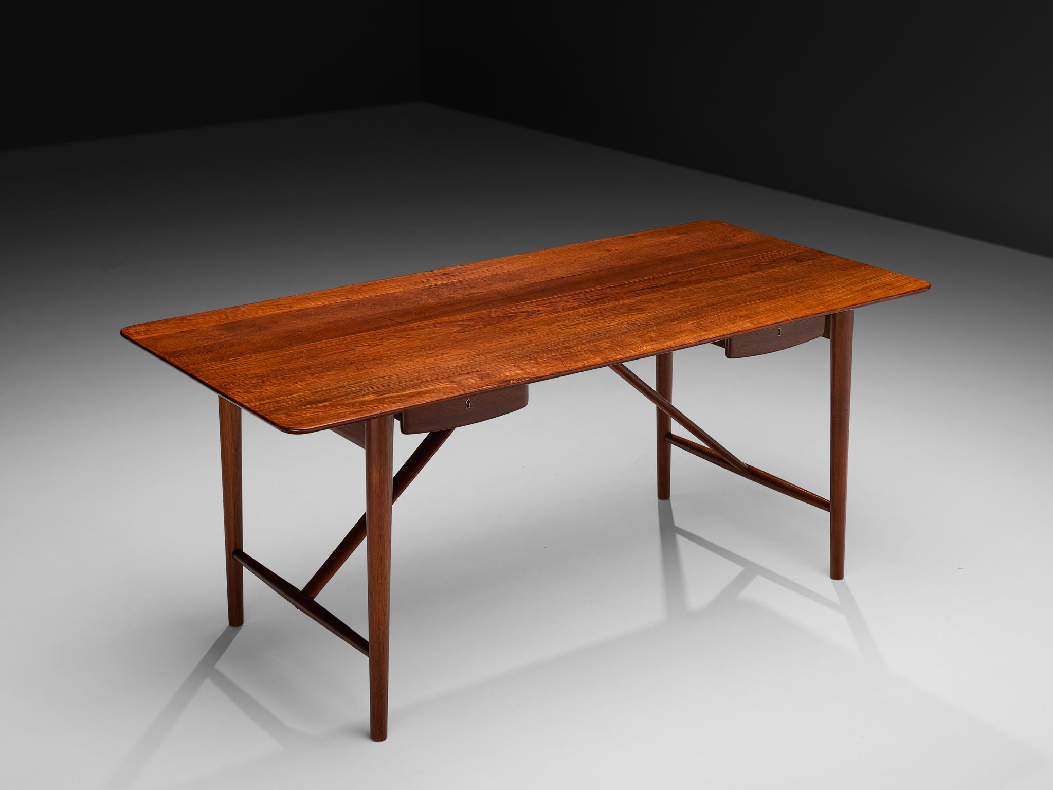 Peter Hvidt and Orla Mølgaard-Nielsen for Søborg Møbelfabrik, desk, model '310', solid teak, Denmark, 1955

Stunning desk designed by Peter Hvidt and Orla Mølgaard-Nielsen. It truly holds the quintessential essence of Danish design with its