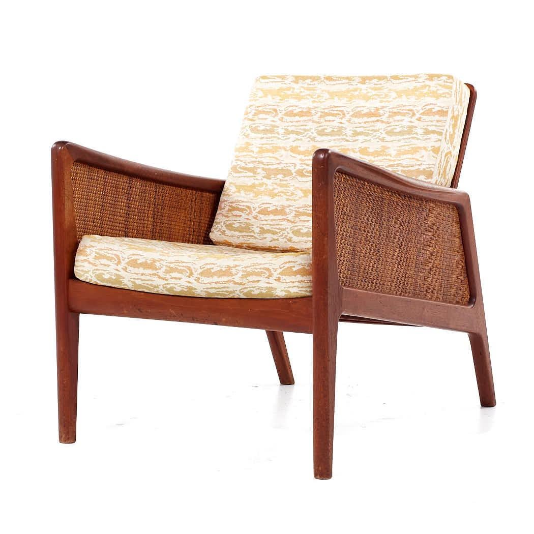 Late 20th Century Peter Hvidt and Orla Mølgaard Nielsen MCM Teak and Rattan Lounge Chairs - Pair For Sale