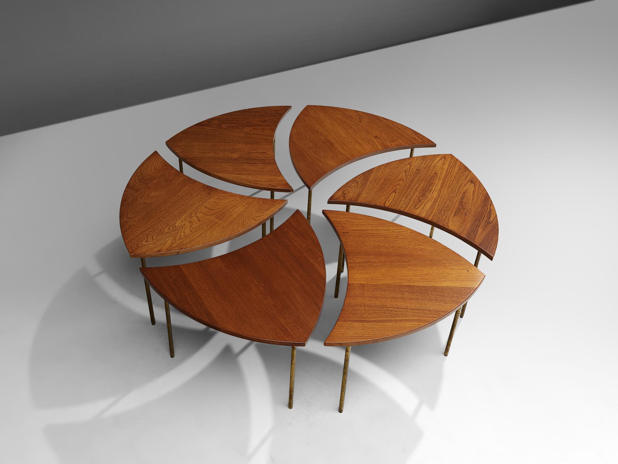 Peter Hvidt and Orla Mølgaard Nielsen coffee table 'FD 523', teak, brass, Denmark, 1950s. 

A modular coffee table, consisting of six organic triangular segments that form together one large round coffee table or different dynamic shapes. The legs