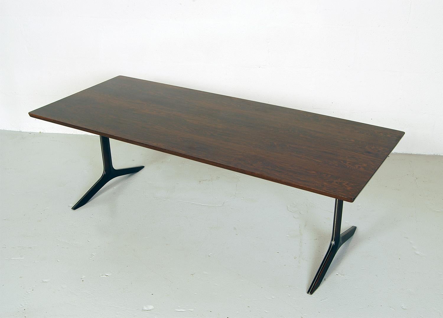 Rare 1960s Midcentury Danish rosewood coffee table by Peter Hvidt and Orla Molgaard Nielsen for France and Sons. Part of the ‘silver line’ series with the aluminium fillet running round the face. A very elegant base, and rare to see in rosewood -