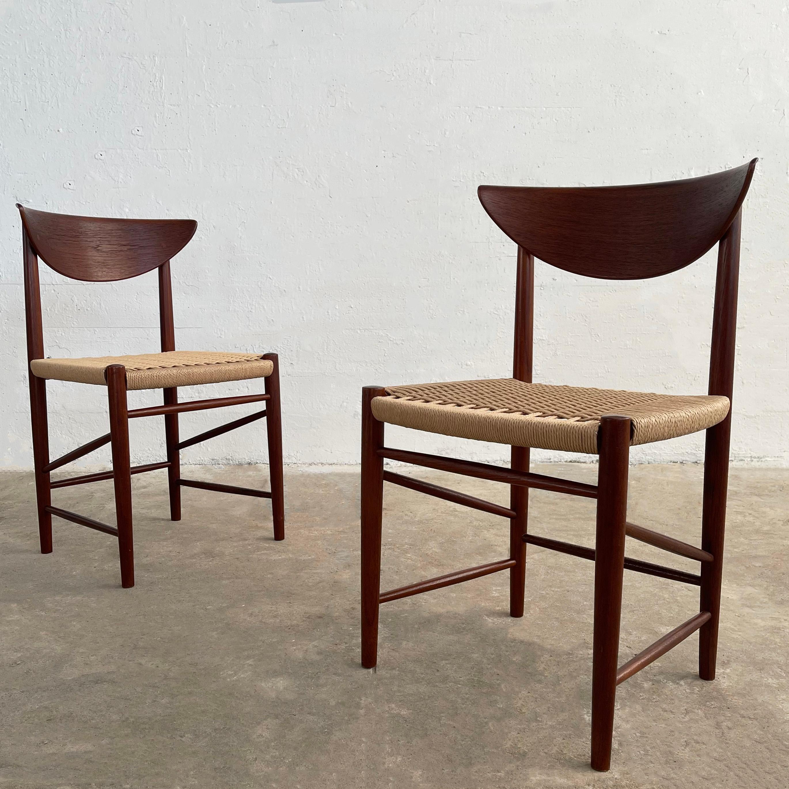 Pair of stunning, Scandinavian modern, dining, side chairs by Peter Hvidt and Orla Molgaard Nielsen for Soborg Mobelfabrik feature newly finished, dark teak frames with scoop backs to contrast the newly woven, light rope seats.