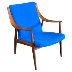 Poltrona in teak di Peter Hvidt e Orla Molgaard Nielsen
