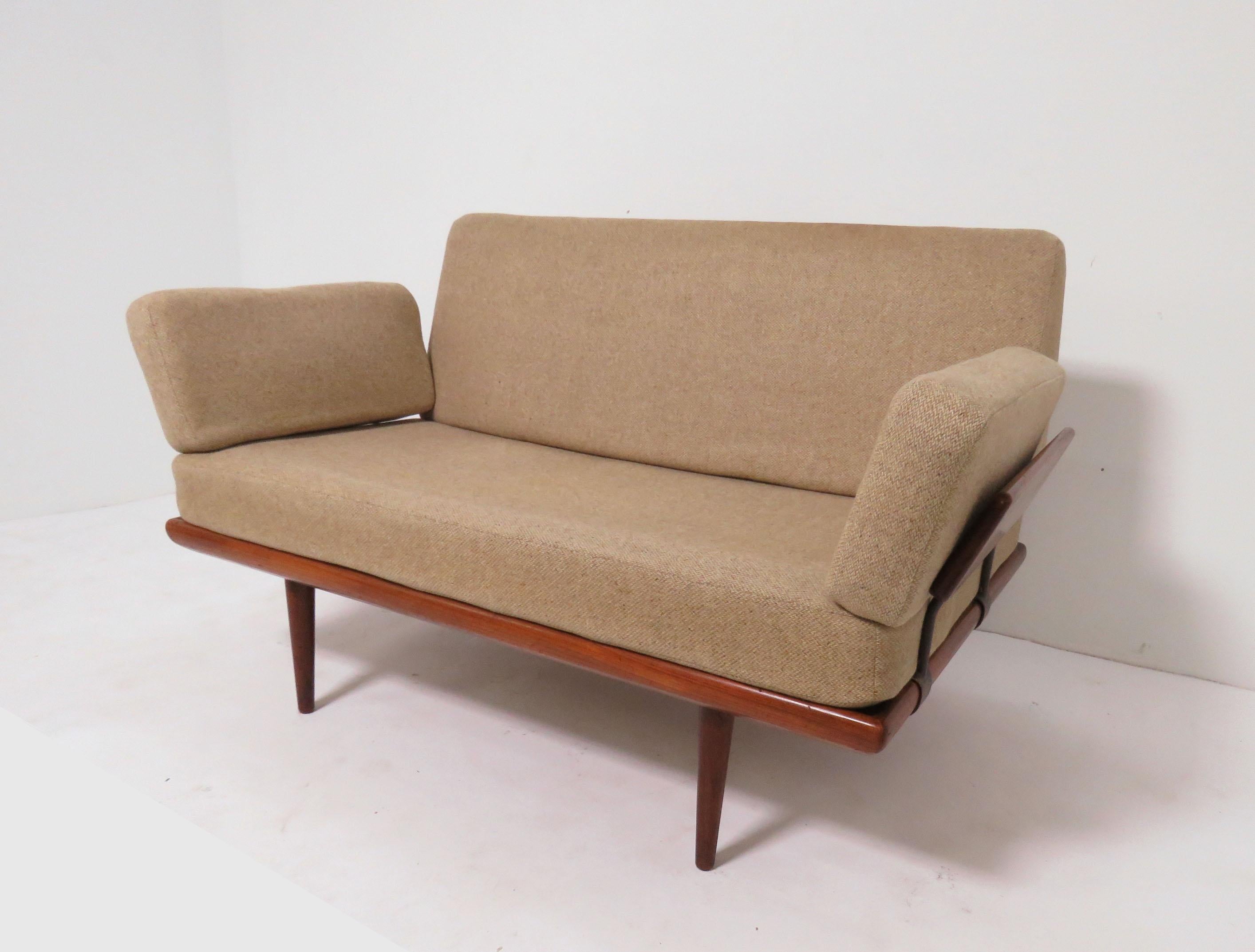 Teak Minerva two-seat loveseat sofa, designed by Peter Hvidt & Orla Molgaard-Nielsen, produced by France and Sons, Made in Denmark, circa 1960s.