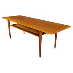 Peter Hvidt and Orla Molgaard Teak Cocktail Table w/ Cane Shelf c.1958 Denmark