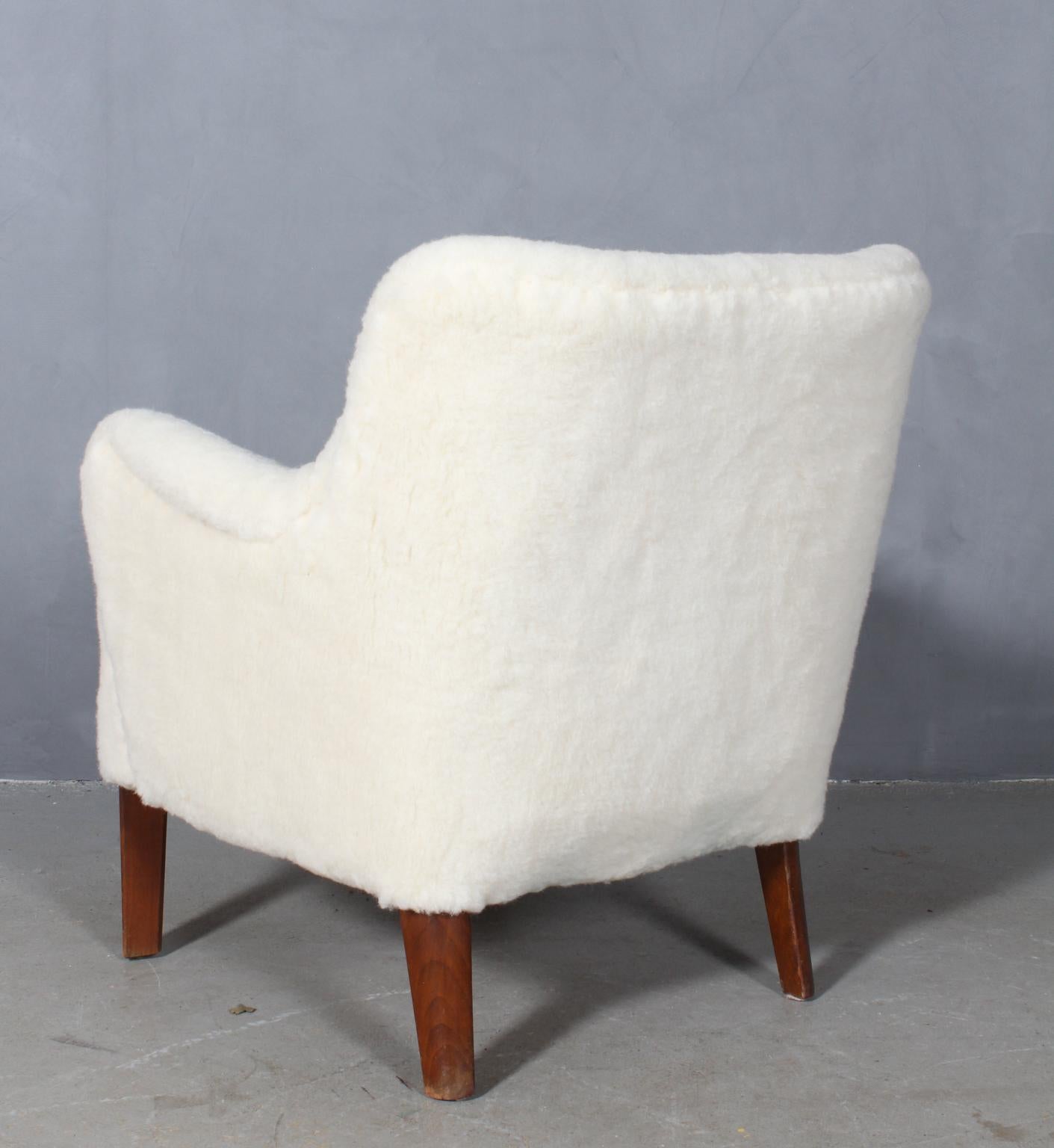 Mid-20th Century Peter Hvidt Early Lounge Chair and Ottoman in Lambskin