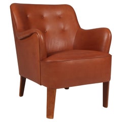 Peter Hvidt Early Lounge Chair in full grain aniline leather.